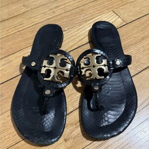 Tory Burch Black Textured Sandals with Gold Emblem